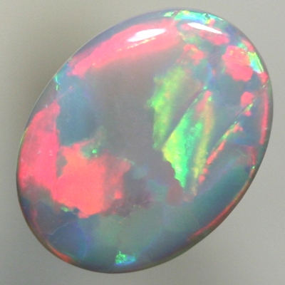 SOLID SEMI BLACK OPAL Rolling flashes of red and green turquoise 